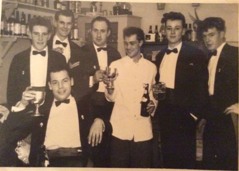 Images/photo (3)Osnabruk officers mess waiters 2 Tex Cohen front left.jpg